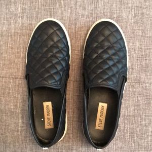 Steve Madden black slip ons